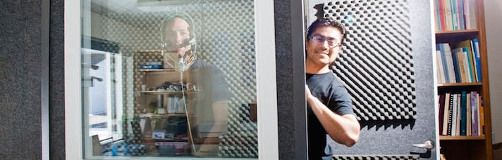 Students working in a sound recording booth